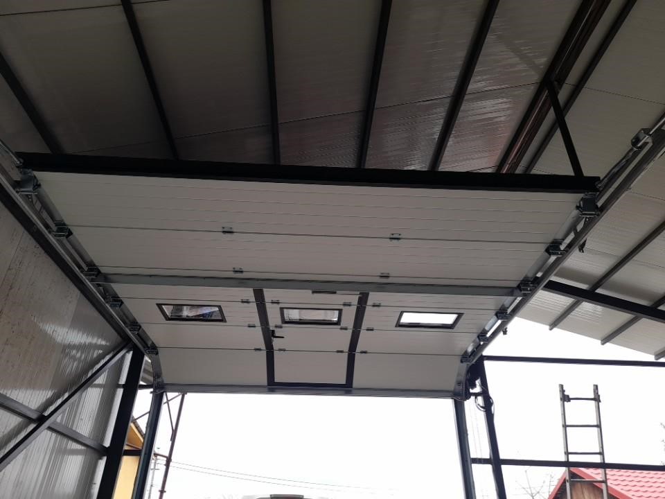 Cât costă un garaj cu ușă secțională high-lift?